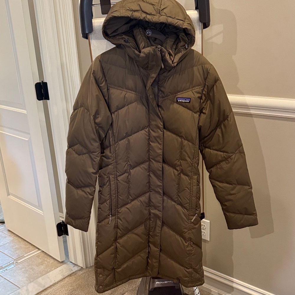 Patagonia Women's Down With It Parka in a brown/tan color.